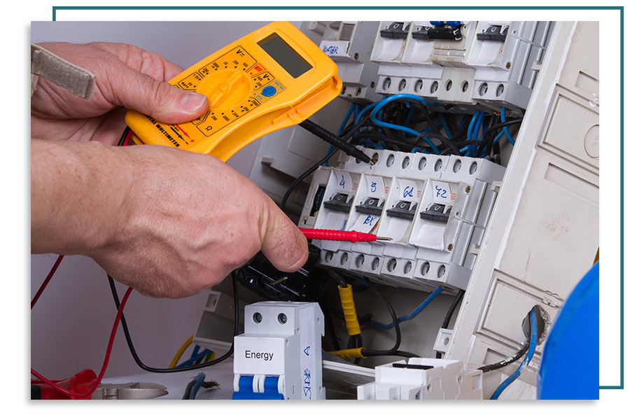 hands-checking-electrical-panel-rockwall-tx